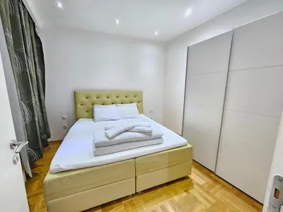 Ein Bett oder Betten in einem Zimmer der Unterkunft Schönbrunn Apartments