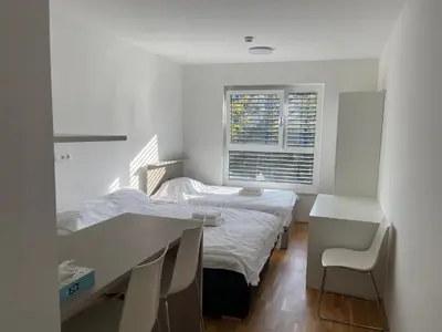 Ein Bett oder Betten in einem Zimmer der Unterkunft Apartament hotel wien
