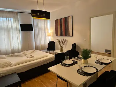 Ein Bett oder Betten in einem Zimmer der Unterkunft Cozy Three-Room Apartment 14