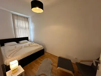 Ein Bett oder Betten in einem Zimmer der Unterkunft Cozy Three-Room Apartment 14