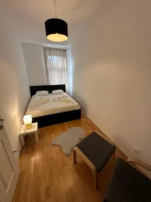 Ein Bett oder Betten in einem Zimmer der Unterkunft Cozy Three-Room Apartment 14