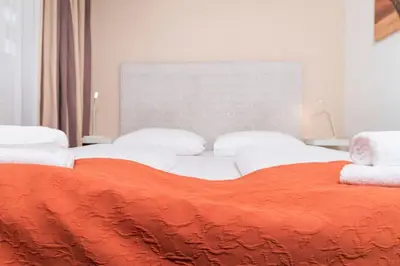 Ein Bett oder Betten in einem Zimmer der Unterkunft Apartment Favoriten top 1