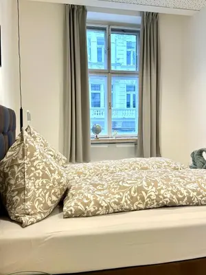 Ein Bett oder Betten in einem Zimmer der Unterkunft Opera apartment 149 m2