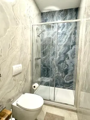 Ein Badezimmer in der Unterkunft Opera apartment 149 m2
