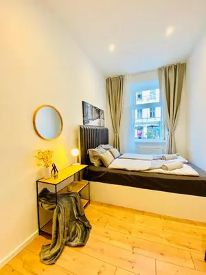 Ein Bett oder Betten in einem Zimmer der Unterkunft Lovely 4-BR Retreat Ottakring with Stunning City