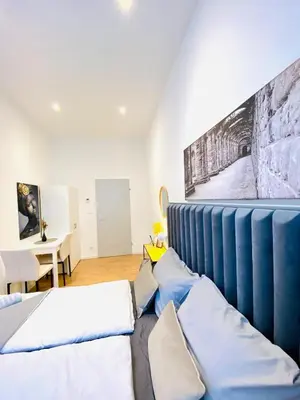 Ein Bett oder Betten in einem Zimmer der Unterkunft Lovely 4-BR Retreat Ottakring with Stunning City