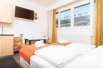 Ein Bett oder Betten in einem Zimmer der Unterkunft Apartment Favoriten Studio Top 31