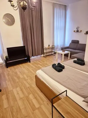 Ein Sitzbereich in der Unterkunft Vega Apartments - Schönbrunn 2