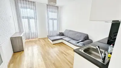 Ein Sitzbereich in der Unterkunft Cozy Apartment- 5 Minutes to Danube River