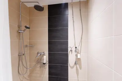 Ein Badezimmer in der Unterkunft Wohnen im 15 ruhig und zentral