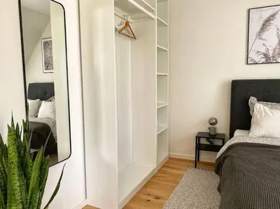 Ein Bett oder Betten in einem Zimmer der Unterkunft Rooftop Apartment with Terrace & AC - Self Check-In