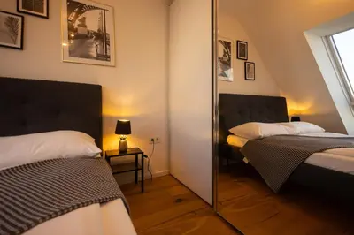 Ein Bett oder Betten in einem Zimmer der Unterkunft Sunny Terrace Penthouse with AC - Self Check-In