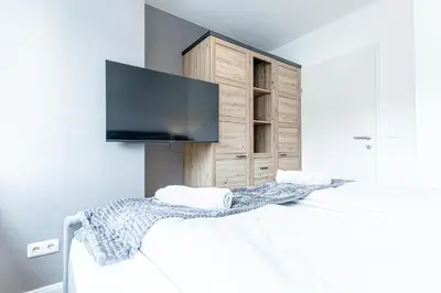Ein Bett oder Betten in einem Zimmer der Unterkunft Central Vienna Chic & Comfortable 1BR & 1LR Apt