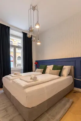 Ein Bett oder Betten in einem Zimmer der Unterkunft josef's home I Deluxe Suite I Quiet & Central