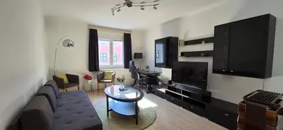 Ein Sitzbereich in der Unterkunft Happy Home
