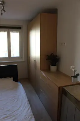 Ein Bett oder Betten in einem Zimmer der Unterkunft Happy Home