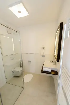 Ein Badezimmer in der Unterkunft Dorfmeister Business Hotel B&B