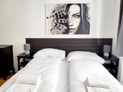 Ein Bett oder Betten in einem Zimmer der Unterkunft City Home Lifestyle Vienna