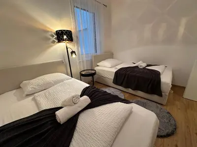 Ein Bett oder Betten in einem Zimmer der Unterkunft Schönbrunn Garden Apartments