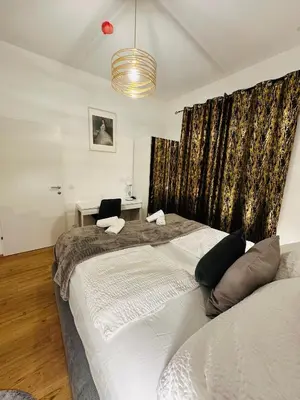 Ein Bett oder Betten in einem Zimmer der Unterkunft Schönbrunn Garden Apartments