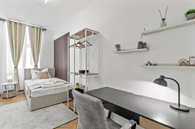 Ein Bett oder Betten in einem Zimmer der Unterkunft Zentrale, stilvolle und gemütliche Wohnung