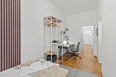 Ein Bett oder Betten in einem Zimmer der Unterkunft Zentrale, stilvolle und gemütliche Wohnung