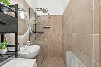 Ein Badezimmer in der Unterkunft Zentrale, stilvolle und gemütliche Wohnung
