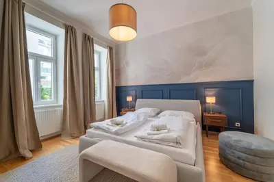 Ein Bett oder Betten in einem Zimmer der Unterkunft josef's home I Vienna Charm Apartment I 02