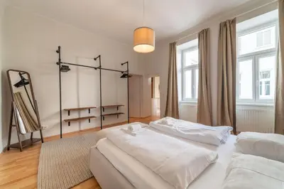 Ein Bett oder Betten in einem Zimmer der Unterkunft josef's home I Vienna Charm Apartment I 02