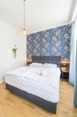 Ein Bett oder Betten in einem Zimmer der Unterkunft josef's home I Kolibri Studio I near UNO & VIC