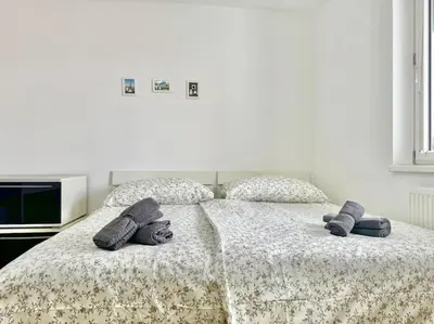 Ein Bett oder Betten in einem Zimmer der Unterkunft 115 m2 Maisonette with Free Parking