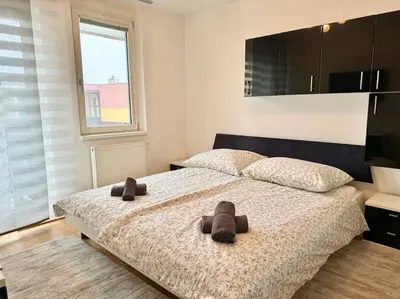 Ein Bett oder Betten in einem Zimmer der Unterkunft 115 m2 Maisonette with Free Parking