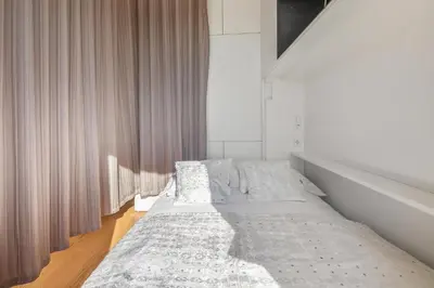 Ein Bett oder Betten in einem Zimmer der Unterkunft Free car parking Appartement- 25min to Downtown
