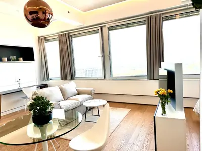 Ein Sitzbereich in der Unterkunft Free car parking Appartement- 25min to Downtown