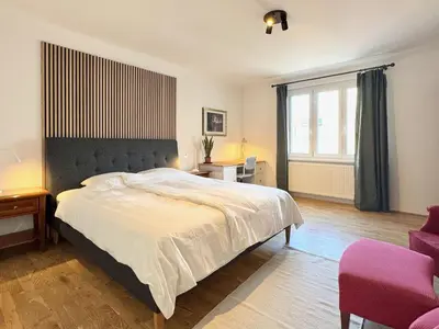 Ein Bett oder Betten in einem Zimmer der Unterkunft Sonnige Wohnung beim Yppenplatz