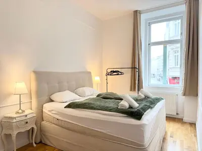 Ein Bett oder Betten in einem Zimmer der Unterkunft Belle Vienna