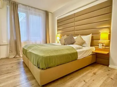 Ein Bett oder Betten in einem Zimmer der Unterkunft Inner City I Walk to Stephansdom I Designer Flat