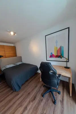 Ein Bett oder Betten in einem Zimmer der Unterkunft Short-Term Rental Vienna