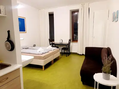 Ein Bett oder Betten in einem Zimmer der Unterkunft Tota K
