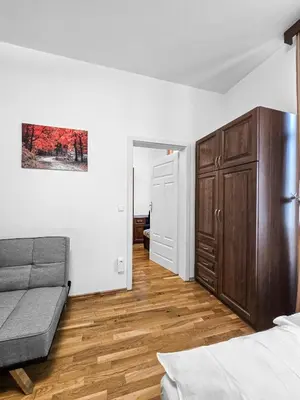 Ein Bett oder Betten in einem Zimmer der Unterkunft Spacious 3-Bedroom Retreat with Balcony for 8 Near Millennium Tower