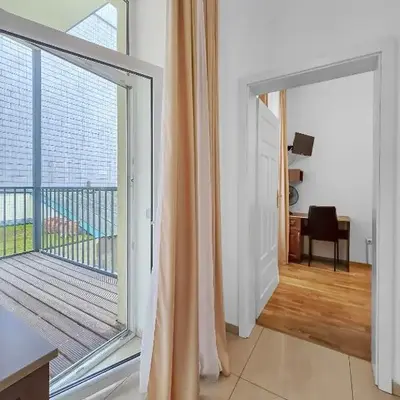 Spacious 3-Bedroom Retreat with Balcony for 8 Near Millennium Tower