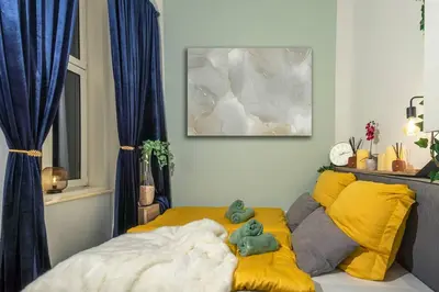 Ein Bett oder Betten in einem Zimmer der Unterkunft LUXURYLOFT - direct access to shopping street, U3 station, close to center