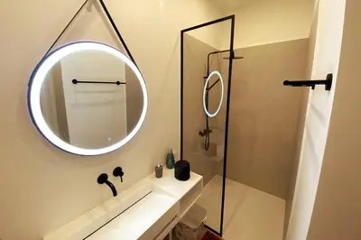 Ein Badezimmer in der Unterkunft Deluxe Apartment mit Suite