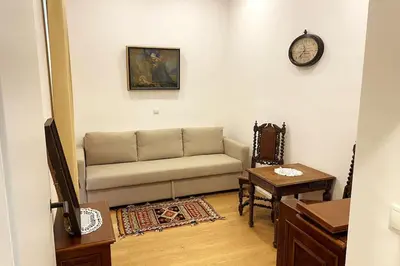 Ein Sitzbereich in der Unterkunft Deluxe Apartment mit Suite