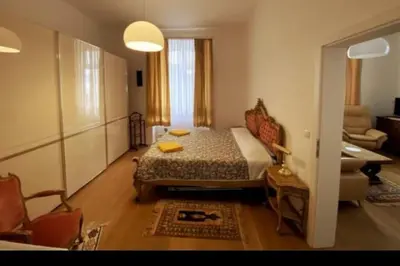 Ein Bett oder Betten in einem Zimmer der Unterkunft Deluxe Apartment mit Suite