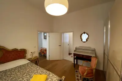 Ein Bett oder Betten in einem Zimmer der Unterkunft Deluxe Apartment mit Suite
