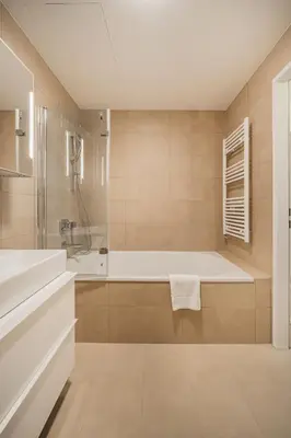 Ein Badezimmer in der Unterkunft Stylish Apartment with Balcony and Pool