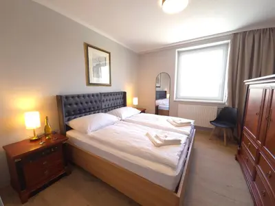 Ein Bett oder Betten in einem Zimmer der Unterkunft Guesthouse Purbach
