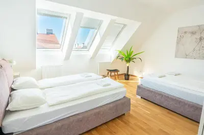 Ein Bett oder Betten in einem Zimmer der Unterkunft Luxury Penthouse with Rooftop Terrace