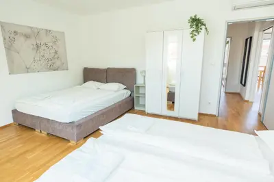 Ein Bett oder Betten in einem Zimmer der Unterkunft Luxury Penthouse with Rooftop Terrace
